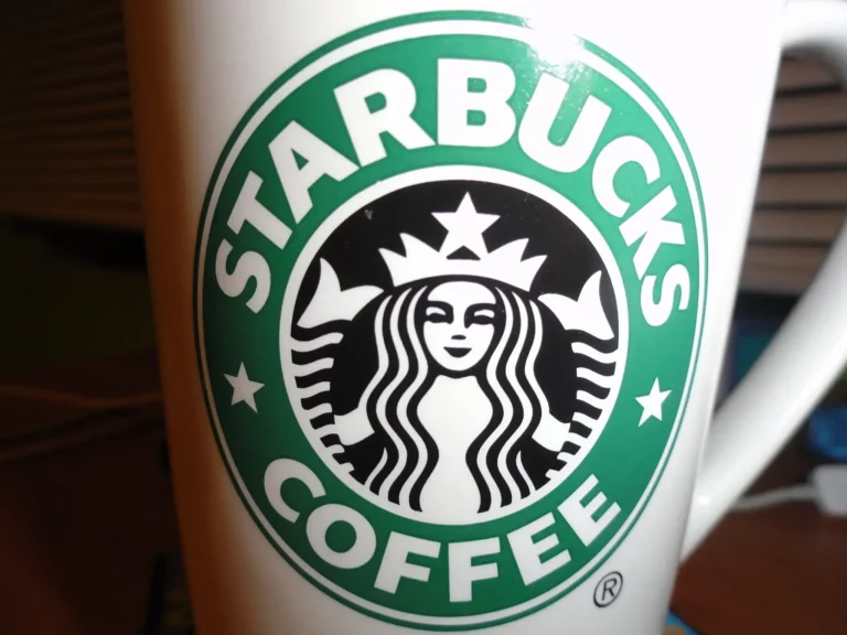 Starbucks reintroduces ceramic mugs and limits store use to paying customers to attract more patrons and improve sales